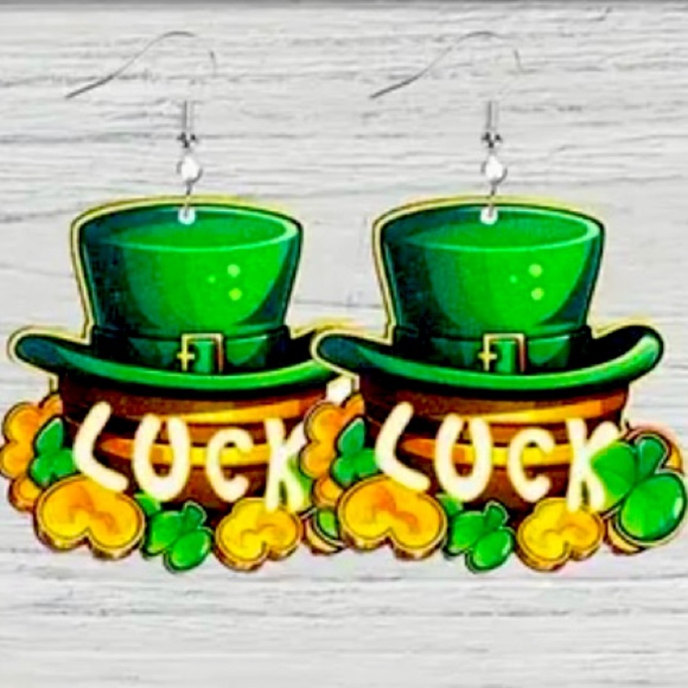 Leprechaun hat earrings carved in a wooden surface. Lightweight and comfortable.